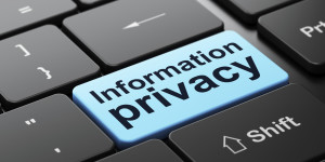 Information Privacy on computer keyboard background